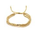 Three-layer 18K gold-plated beaded bracelet featuring a polished heart pendant and drawstrings - Gold