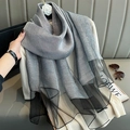 Detail of gray silk scarf with black mesh trim highlighting premium texture and drape - Silver Black
