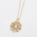Minimalist gold necklace featuring a rotating heart pendant with white pearls and rhinestones - Round Heart (5546874938802)
