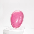 Pink translucent egg-shaped hairbrush with silver glitter in a portable compact design - Starry Pink Transparent