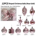 12-piece rose gold Christmas ornament set with assorted stars, pinecones, and round baubles - 12 Uniquely Shaped Christmas Balls (rose Gold)