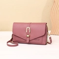 Detailed side view of dusty pink crossbody phone wallet with golden hardware - Deep Pink