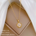Detailed close-up of gold hollow flower pendant necklace with zircon inlay on brown box - Stainless Steel Chain + Copper Pendant / Hollow Flower Necklace (H503)