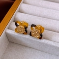 Macro detail of gold flower earrings with tortoiseshell resin petals in a jewelry box - Gold-Tortoise (Luxury Gold Plated)