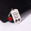 Macro shot of stainless steel military tag with Always my Sister engraving and heart charm - Style 21 (Red Heart Sisters)