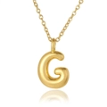 Delicate 18K gold plated copper initial G pendant necklace with fine chain on white background - Letter G
