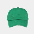 Close-up of bright green washed cotton baseball cap with distressed torn details - Green