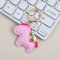 Pink faux leather horse keychain with a golden money bag charm and round metal clip - Mini / Pink