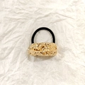 Black elastic hair tie featuring a hollow golden textured alloy charm for women - Gold Irregular Lava 5cm