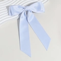 Elegant light blue satin bow hair clip with long ribbons on a decorative stone base - Blue