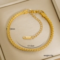 Macro shot of 4mm gold braided stainless steel anklet with lobster clasp and extension - 6-4 (4mm Woven Wheat Chain)