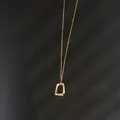 Minimalist gold geometric pendant necklace with matte finish on thin titanium O-chain - Trapezoid