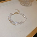 Vintage irregular freshwater pearl bracelet with gold hardware and small pearl charm tail - Pearl Butterfly Charm Bracelet