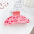 Pink heart and arrow pattern hair claw clip in elegant resin finish on white desk - Heartbeat Moment - Small Semicircle