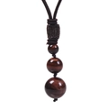 Détail de perles en pierres naturelles avec cordon tressé à la main de couleur marron - Collier Œil de Tigre Rouge-3 Perles