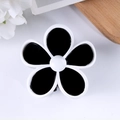 Pinza per capelli a fiore a cinque petali in bianco e nero con finitura lucida - Nero
