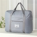 Large gray waterproof nylon travel tote bag with durable handles and front pocket - Gray