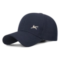 Navy blue cotton baseball cap featuring embroidered beige logo for outdoor sports - Navy Blue