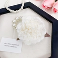 Elegant white floral wrist corsage with pearls and green leaves for weddings - White Peony