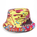 Detailed close-up of vibrant graffiti monster print on a high-density yellow bucket hat - M (56-58cm) / Yellow Monster Graffiti (Shark)