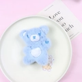 Cute light blue plush bear keychain with white heart embroidery on a decorative plate - Blue Bear