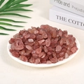 Polished natural rose quartz crystal chips in a white dish for home decoration - Strawberry Quartz (9-12mm) 100g