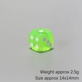 Macro detail of 14mm fluorescent green resin dice with 2.5g weight and white dots - Grass Green