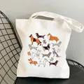 Cream canvas tote bag featuring geometric origami dog illustrations and top handles - C18 Origami Geometric Dogs
