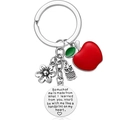 Detail of teacher appreciation keychain with red apple charm and engraved quote pendant - A4-Round Plate