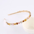 Golden baroque headband with colorful crystals and rhinestones on a white bowl edge - Style 21-Gold