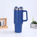 Close-up of deep blue 40oz insulated tumbler with ergonomic handle and clear sliding lid - Blue (Generation 1)
