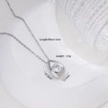 Collana in titanio argento con ciondolo a cuore e cornice a goccia su ceramica bianca - goccia / Goccia d'argento