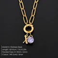 Stainless steel paperclip chain necklace with gold letter X and purple gemstone - Lowercase x