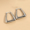 Polished silver triangular hoop earrings in a minimalist thick metal geometric design - Triangle Hollow Steel Color