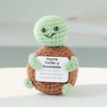 Handmade crochet turtle plush with a positive message card in brown and light green - Little Turtle
