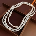Elegante collana di perle bianche multistrato per donna con stile retrò classico da maglione - Bianco