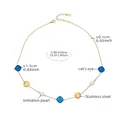 Dettaglio della collana in acciaio placcato oro 18k con occhio di gatto blu e perle - Oro Occhio di Gatto Blu