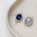 Detail of 20mm x 14mm blue gemstone pendant with pearl halo and silver-plated base - 9# White Gold Pearl Deep Blue Zirconia