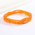 Detailed view of layered orange glass bead chain for waist or wrist styling - Orange