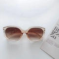 Oversized retro light amber cat-eye sunglasses with brown gradient lenses and flat lay card - Champagne