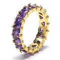 Detail of gold-plated ring featuring full-circle purple triangle-cut zircon stones - US 6 / Gold Purple Zirconia