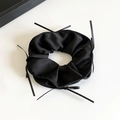 Elegant black satin ribbon bow hair scrunchie accessory for women in ballet style - Black