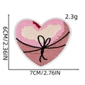 Pink heart embroidery patch with black bow, measuring 6x7cm for clothing and bags - Pink Heart with Bow