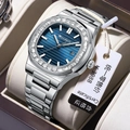 Silver nautilus-style quartz watch with diamond bezel and blue textured dial - Silver Steel Blue Dial