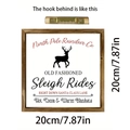 Detail of wooden Christmas sign with North Pole Reindeer logo and sawtooth metal hanger - Christmas Reindeer Sleigh