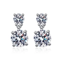 Macro view of silver double round zircon stud earrings with a polished mirror reflection - Geometric Stud Earrings (ED25)