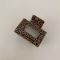 Close-up of leopard pattern square hair claw clip with sturdy metal spring detail - Small Square / Brown