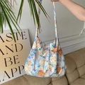 Detail of the blue floral canvas tote bag showing the wide strap and large capacity - Blue Peony