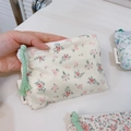 Detailed close-up of a floral cotton coin purse with green zipper rope and textile tag - Off-white Pink Sprig