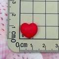 Mini red matte resin heart measured with ruler for DIY nail art and jewelry making - Red
